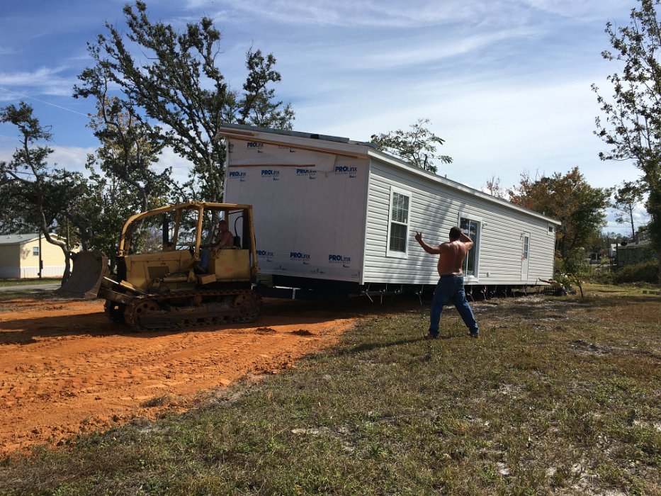 12-maneuvering house on lot.jpg